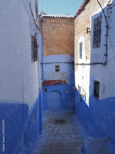 Focus on moroccan alley in Chefchaouen city in Morocco - vertical © Jakub Korczyk