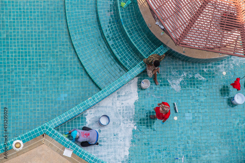 Renovation, maintenance, repair, and tiling work of a swimming pool	