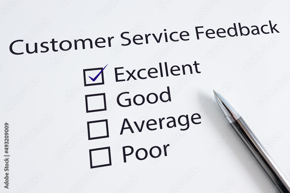 Close up of Customer Service Feedback form. Tick placed in excellent check-box. Close up of Customer Service Feedback form. Tick placed in excellent check-box.