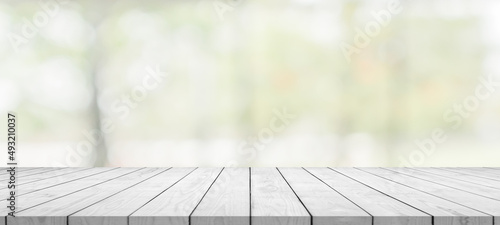 Empty white wood table top with blur kitchen bokeh background