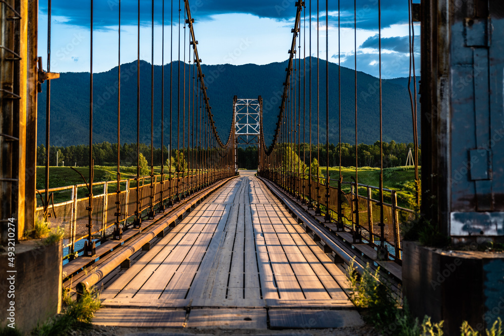 Fototapeta premium Multa Bridge crossing Katun river on Altai