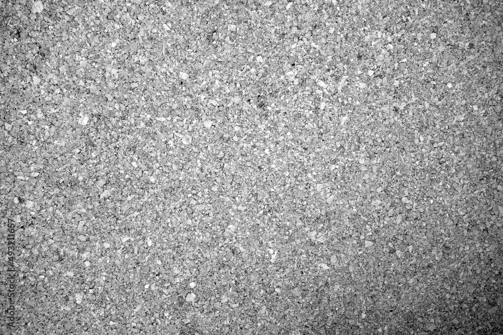 Cork board texture in black and white.