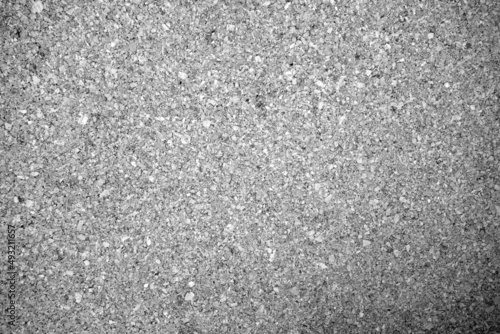 Cork board texture in black and white.