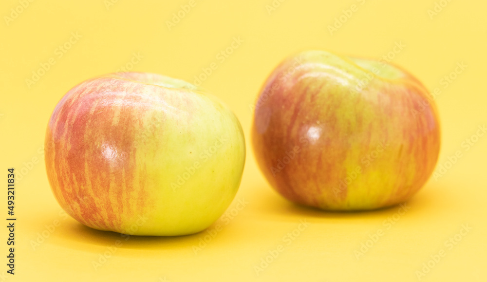 apple isolated on yellow background. Clipping path. Fresh organic apple apple isolated on yellow background. Clipping path. Fresh organic apple