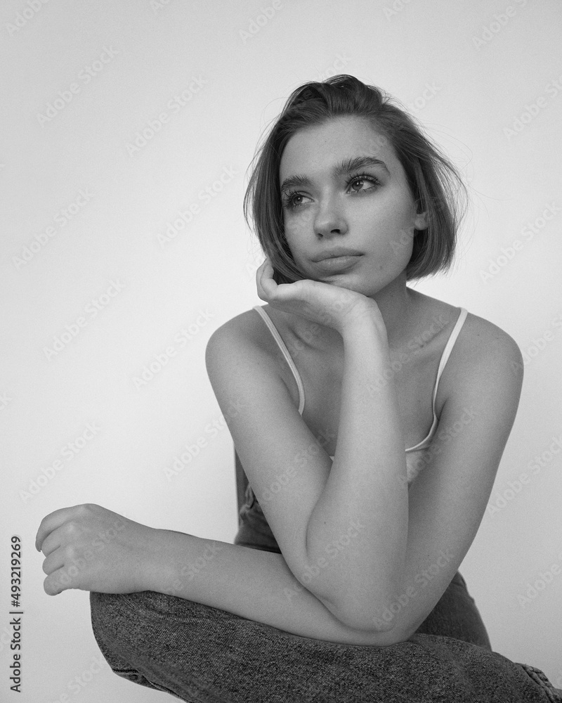 Obraz premium Model posing in studio on white background