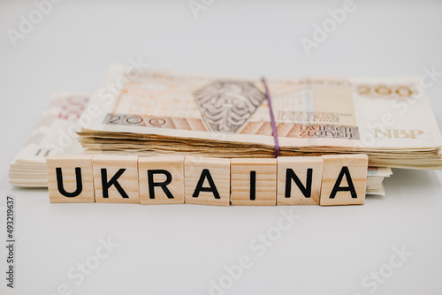 Napis Ukraina na tle polskich banknotów photo