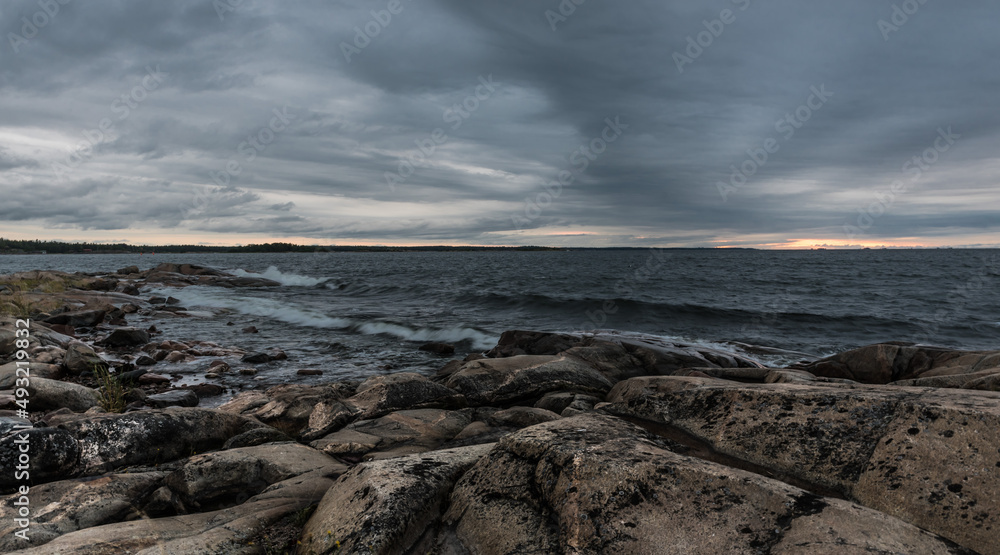 Dark clouds and wild rocks at the coastline of the Baltic Sea Dark clouds and wild rocks at the coastline of the Baltic Sea