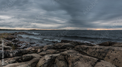 Dark clouds and wild rocks at the coastline of the Baltic Sea