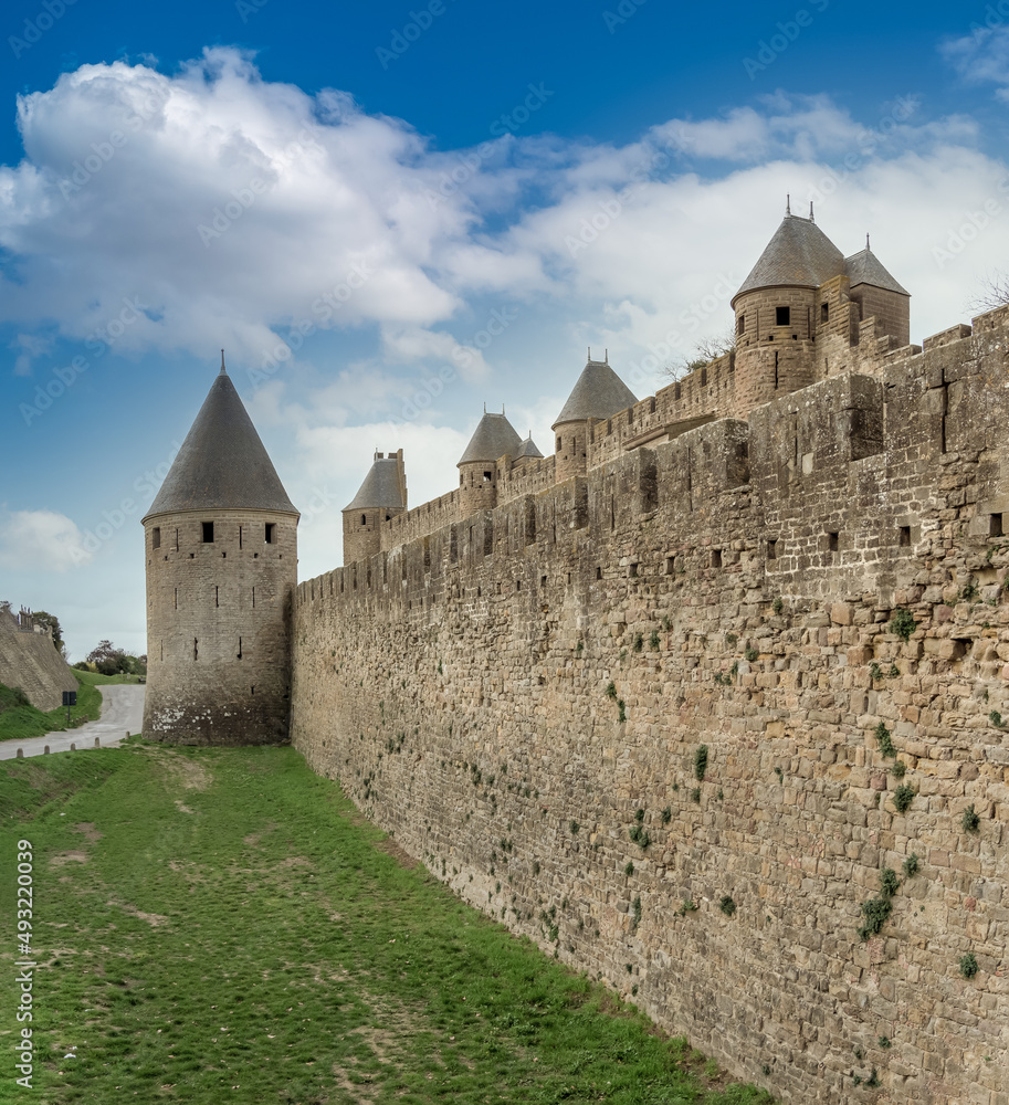 Ruins of the fortified medieval citadel of Carcassone, Aude, Occitanie, France. An imposing UNESCO World Heritage Site