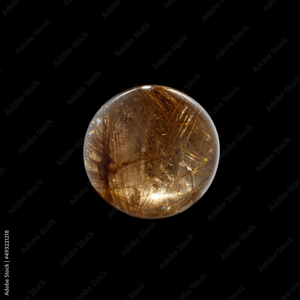 Ball of quartz with rutile on a black background Ball of quartz with rutile on a black background