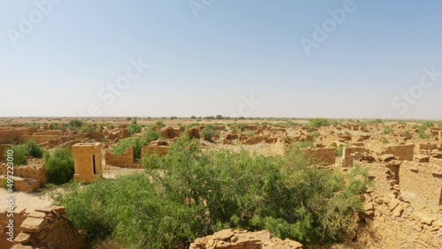 4K shot of the abandoned Kuldhara village near Jaisalmer, Rajasthan, India. Panning shot of old ruins of haunted Kuldhara village.	 photo