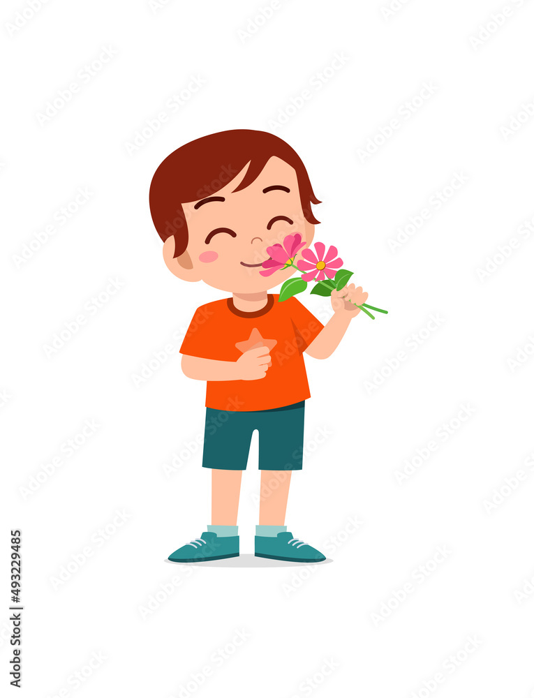 little boy holding flower and sniff the scent little boy holding flower and sniff the scent