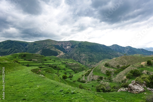 Fototapeta Naklejka Na Ścianę i Meble -  Views of the mountains of Dagestan near the village of Gamsutl. Russia June 2021