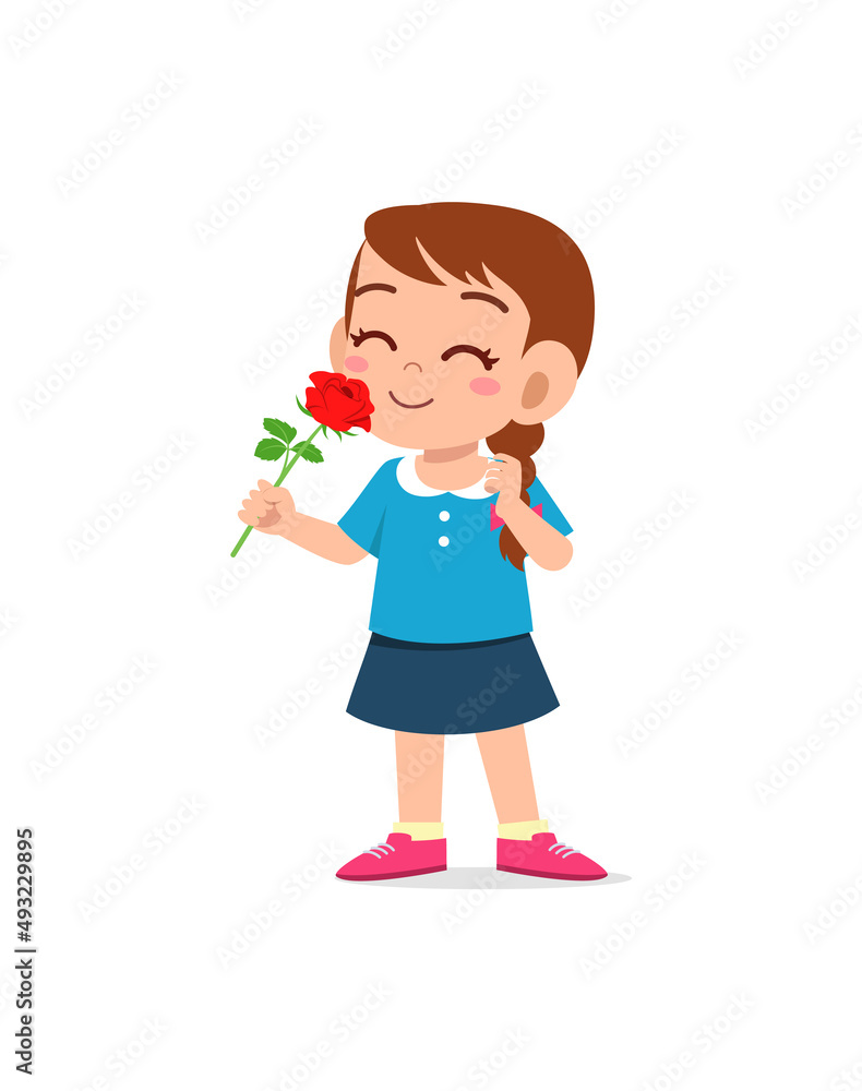 little girl holding flower and sniff the scent little girl holding flower and sniff the scent
