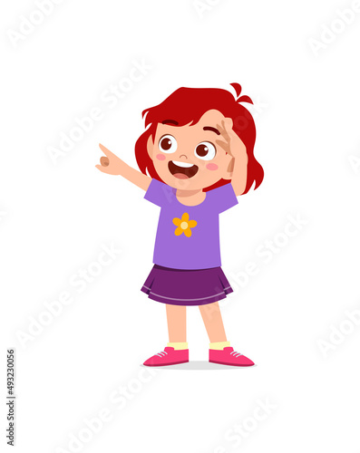 little girl standing and try to see far away