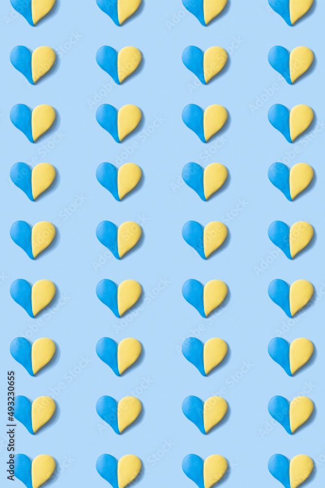 Pattern with heart shape of yellow-blue colors of the Ukrainian flag. Vertical format Pattern with heart shape of yellow-blue colors of the Ukrainian flag. Vertical format