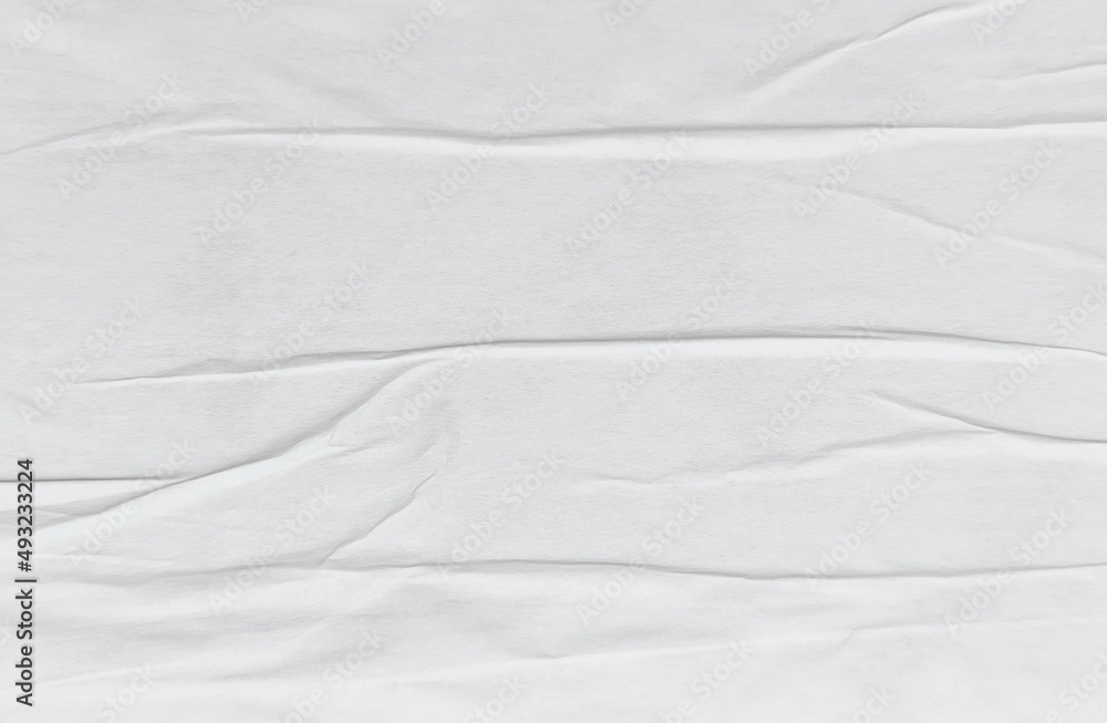 Glued paper sheet texture with wrinkle, creased on billboard poster, white background Glued paper sheet texture with wrinkle, creased on billboard poster, white background