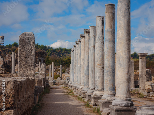 Agora columns with great sky viewin Perge or Perga ancient Greek city - once capital of Pamphylia in Antalya Turkey on warm October afternoon.