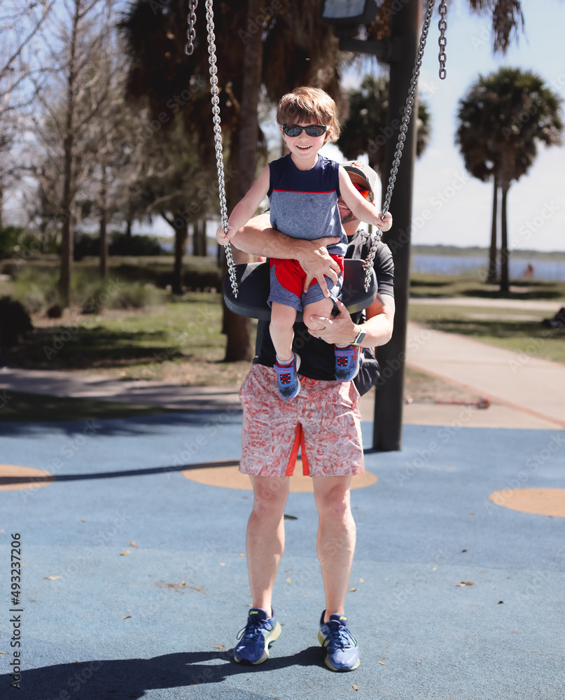 Kissimmee Lakefront Park Grassy waterfront park with walking paths, a