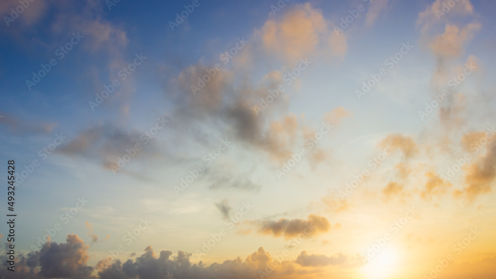sunset sky with clouds in the evening on golden hour sunset sky with clouds in the evening on golden hour