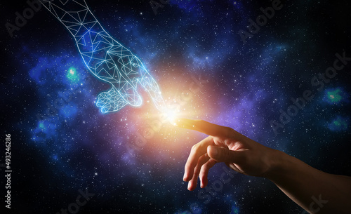 Digital business hands touching with hand polygon pointing at abstract blue cyberspace background.