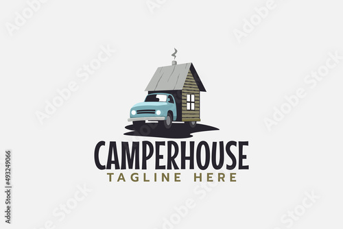 camper house logo with a truck and a tiny house in the back.