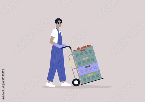 A young character in a denim overall pushing a cargo cart with vegetable and fruit crates stacked  on it