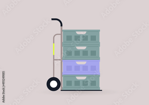 Empty supermarket plastic crates stacked on a shipping cart