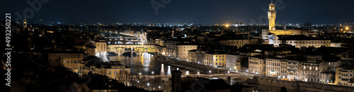 Florence, Ponte Vecchio, Arnolfo tower and river Arno. Cultural famous places in hi-res shot. Tuscany, Italy.