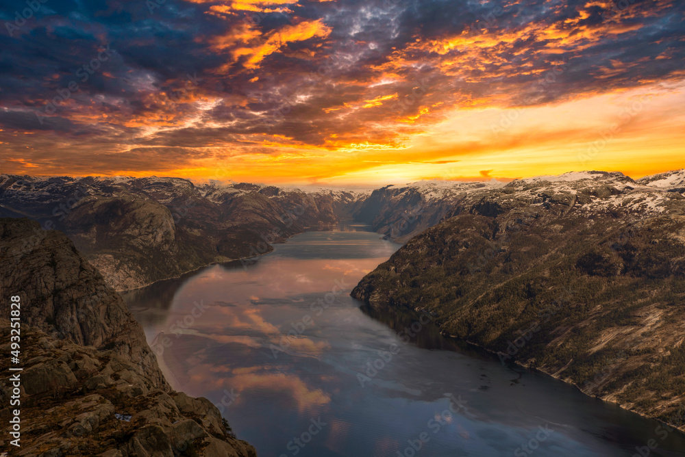 Epic sunset over the river and mountains