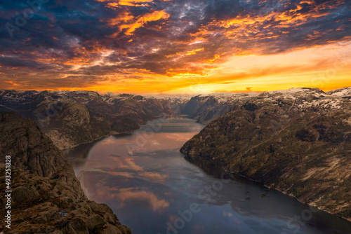 Epic sunset over the river and mountains