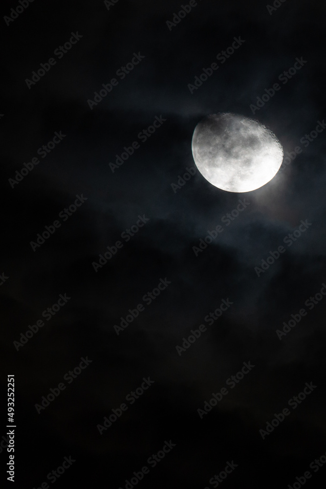 moon at night. on such a dark night. vertical photography. copy space for life quotes and religion, greeting cards and decorations. 