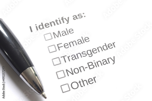 Image of a sexual identification survey question and answer choices with pen.