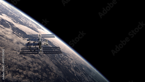 illustration of the International Space Station, ISS, with the planet earth in the background for web articles,posters etc. (ID: 493258042)