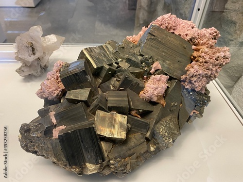 Pyrite, Rhodochrosite or Pyrit, Rhodochrosit (minerals and crystals in the exhibition Mount Säntis - worlds of experiences on the Santis summit) - Switzerland (Schweiz) photo