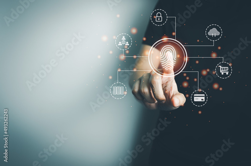 Person touching screen to fingerprint scanner, security access information, big data management concept, Internet of things, cloud computing, internet connection, shopping online and cashless society.