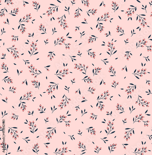 Vector seamless pattern. Pretty pattern in small flower branches with berries. Small pink flowers. Rose pink background. Ditsy floral background. The elegant the template for fashion prints. 