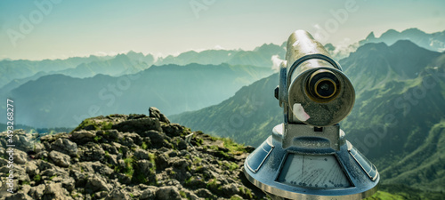 Canvas Print Binoculars telescope in the mountains alps in the Kleinwalsertal in Austria with