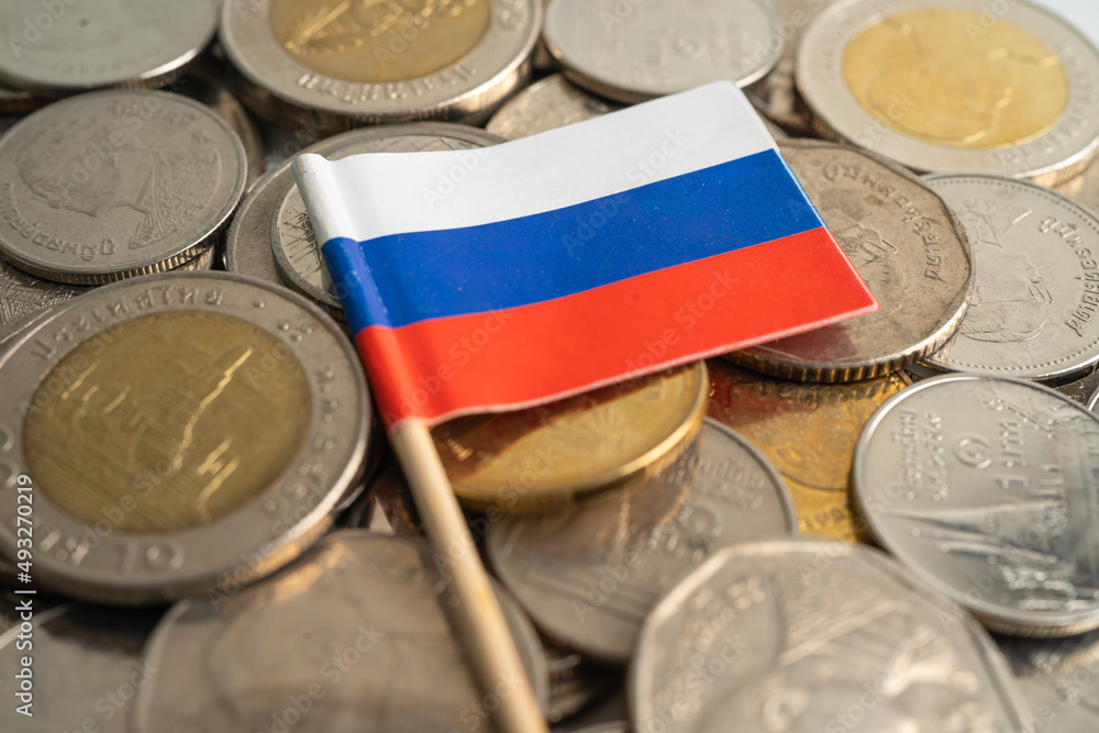 Russia flag on coins background, finance and accounting, banking concept.