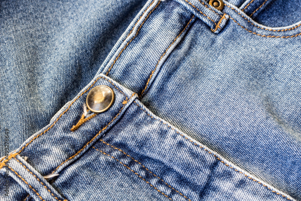 jeans trousers close up of denim material jeans trousers close up of denim material