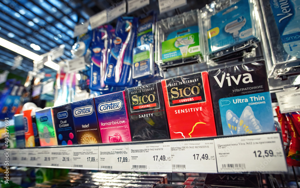 Minsk, Belarus. Feb 2022. Condoms shelf on the counter of supermarket