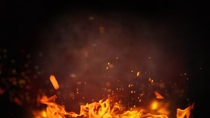 Fire embers particles over black background. Fire sparks background. Abstract dark glitter fire particles lights.
