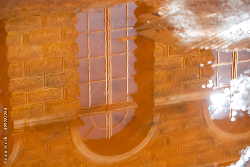 Reflection of the Dresden Zwinger in a puddle