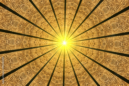 Yellow Sun with radial rays design. Light brown round ornament  kaleidoscope abstract art picture.