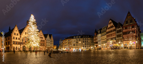Frankfurter Römer with illuminated christmas tree - panorama at night