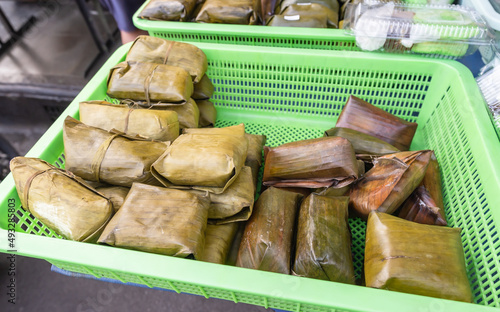 Indonesia Traditional Snacks called buras or arem arem photo