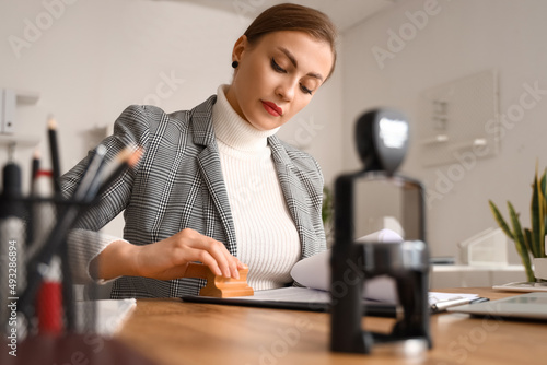 Female notary public attach...