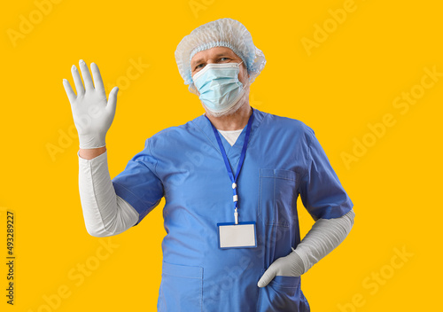 Mature doctor in medical ma...