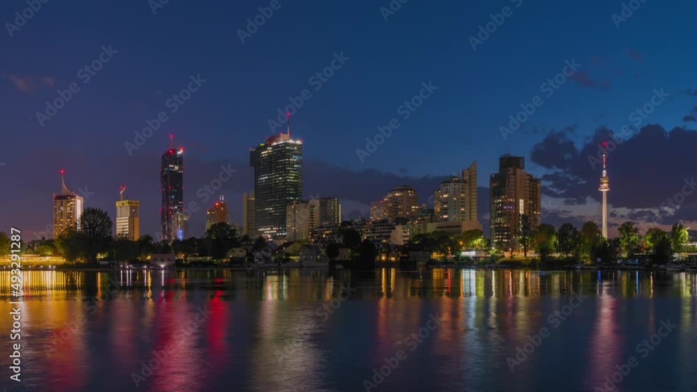 Vienna Skyline Downtown - international center skyscrapers with Kaiserwasser lake - Austria Night Timelapse with Clouds Vienna Skyline Downtown - international center skyscrapers with Kaiserwasser lake - Austria Night Timelapse with Clouds