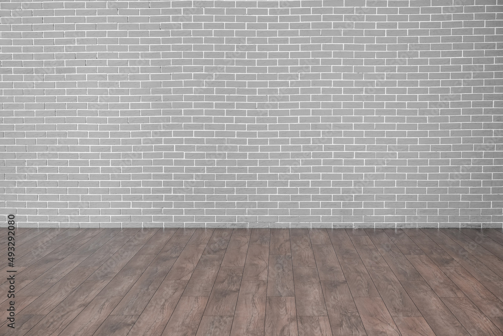 View of grey brick wall in empty room